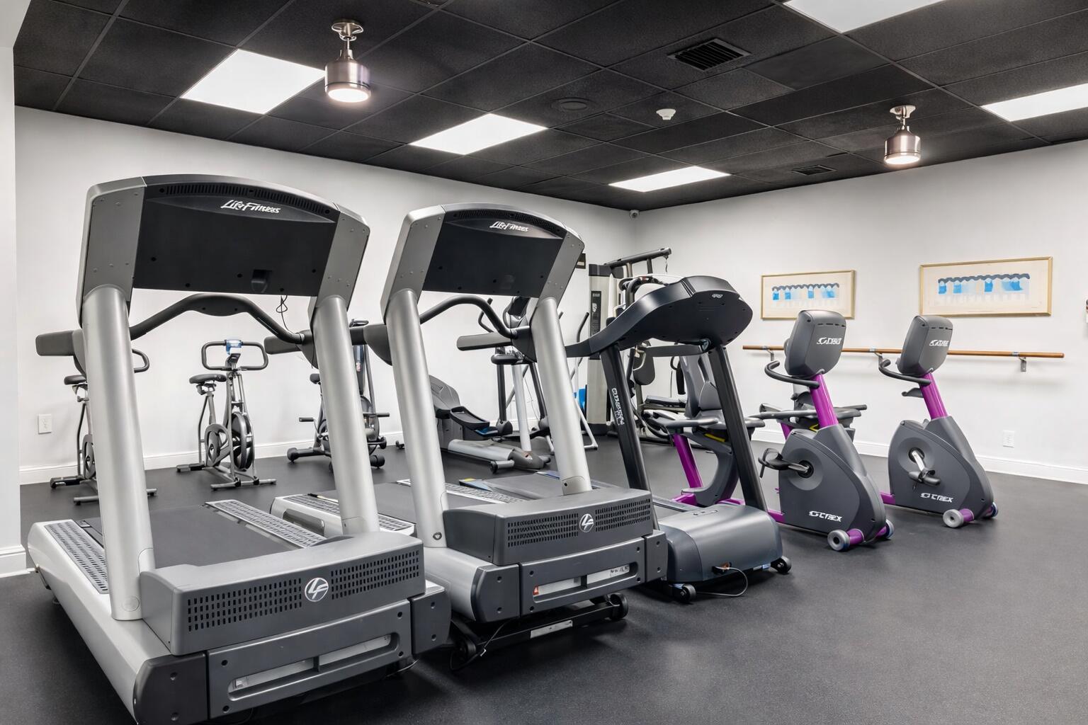 300 Berkley Road, Unit 112 Hollywood, FL 33024 - Photo 13 of 19 a view of a room with gym equipment