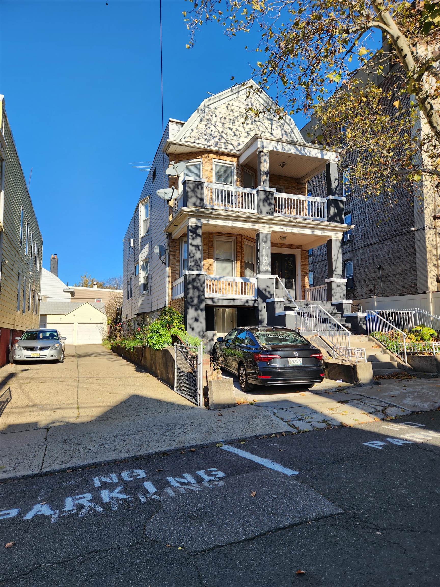 168 Fairview Avenue, Unit 1 Jersey City, NJ 07304 - Photo 2 of 17 a car parked in front of a building