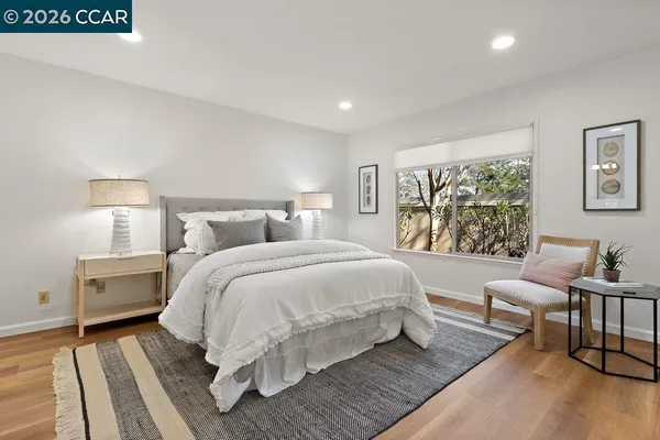 a bed room with a bed and a couch