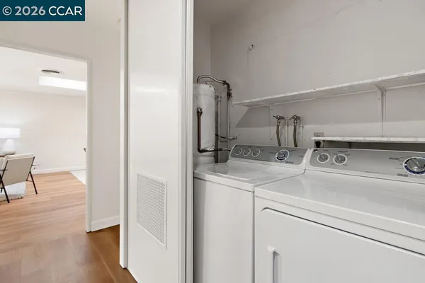 a view of a dinning table and chairs in patio
