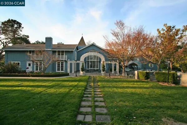 a front view of a house with street