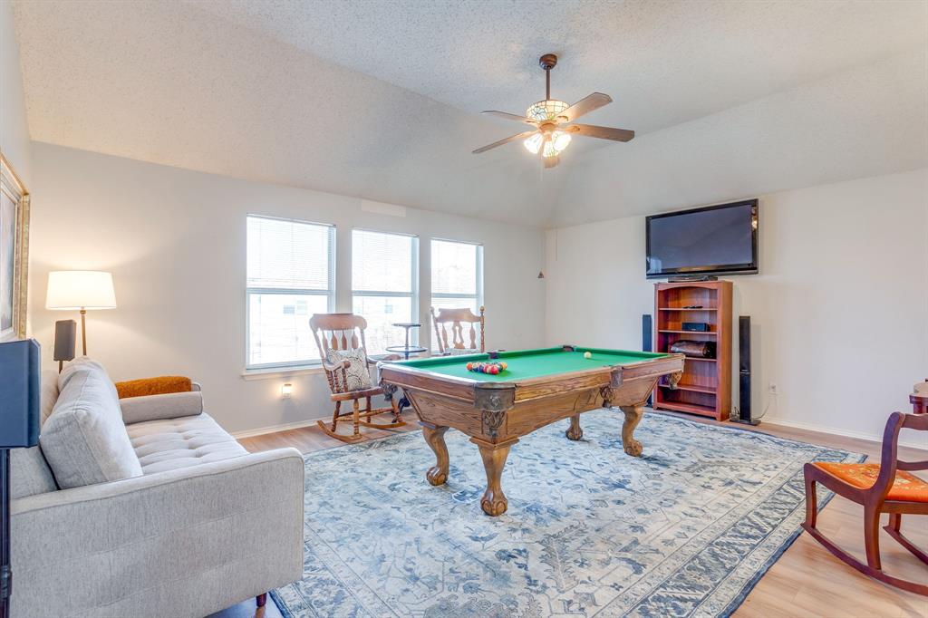 4816 Sleepy Ridge Circle Fort Worth, TX 76133 - Photo 19 of 36 Game room featuring light wood-style floors, a ceiling fan, and pool table