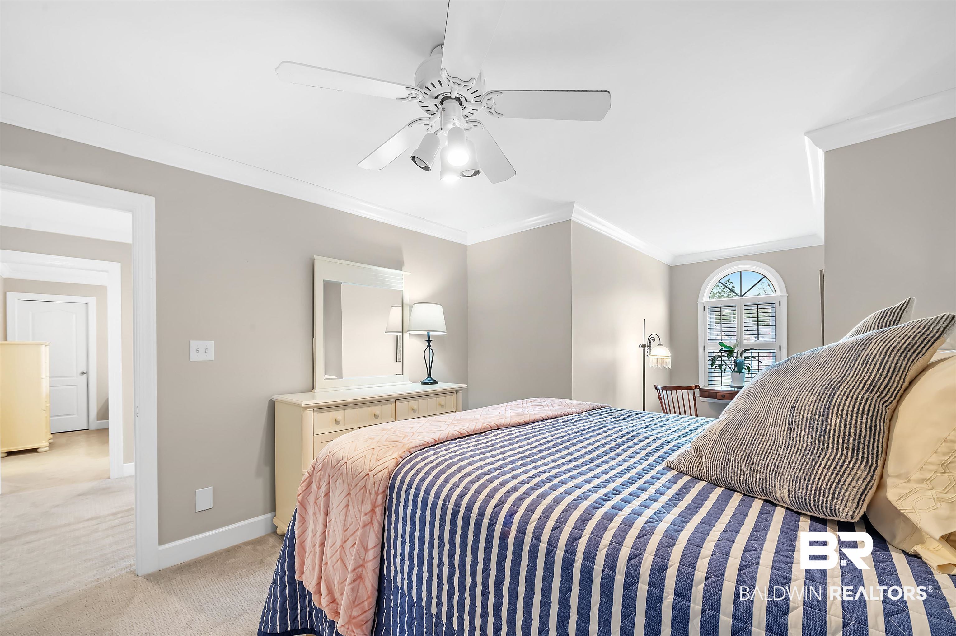 8915 Bay Point Drive Elberta, AL 36530 - Photo 63 of 74 Bedroom with ceiling fan, baseboards, crown molding, and light colored carpet