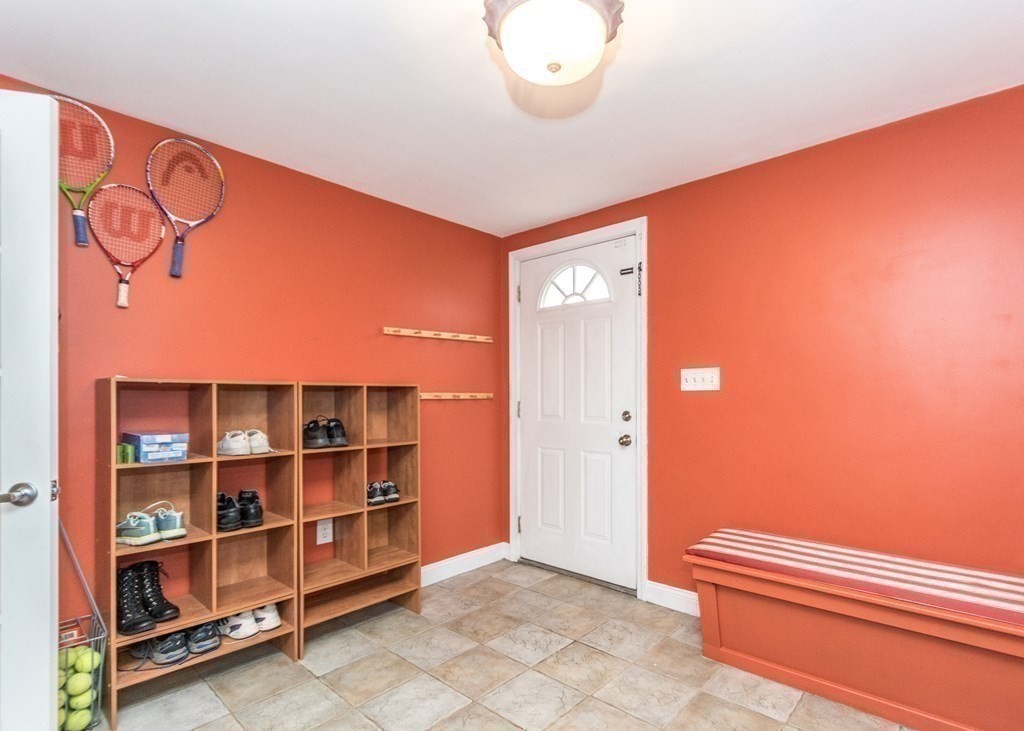 91 Brewster Road Waltham, MA 02451 - Photo 29 of 41 a view of a room with shelves