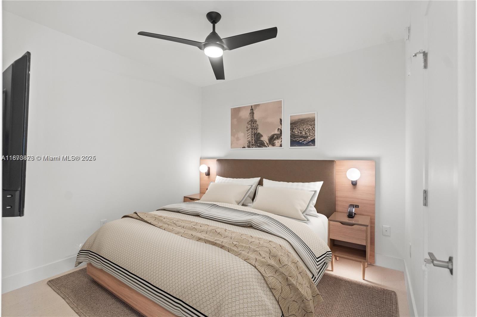 159 Northeast 6th Street, Unit 2403 Miami, FL 33132 - Photo 15 of 18 a bedroom with a bed and a painting on the wall