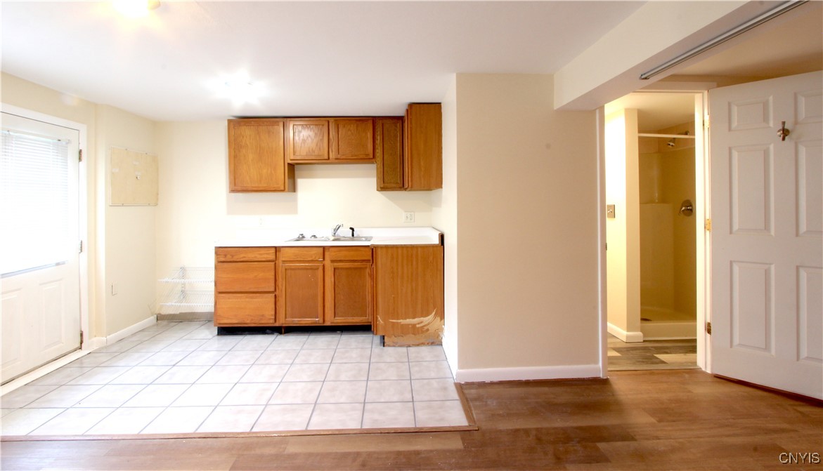 8394 A Shallowcreek Road, Unit A Clay, NY 13090 - Photo 15 of 28 Walk-out Basement. Entrance is from the driveway.