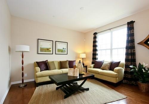 6358 Birmingham Street, Unit 104 Chicago Ridge, IL 60415 - Photo 3 of 8 a living room with furniture and a window