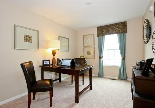 6358 Birmingham Street, Unit 104 Chicago Ridge, IL 60415 - Photo 4 of 8 a view of a workspace with furniture and a window