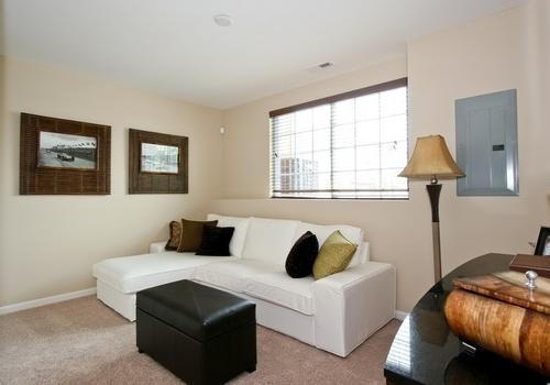 6358 Birmingham Street, Unit 104 Chicago Ridge, IL 60415 - Photo 5 of 8 a bedroom with a bed and a window