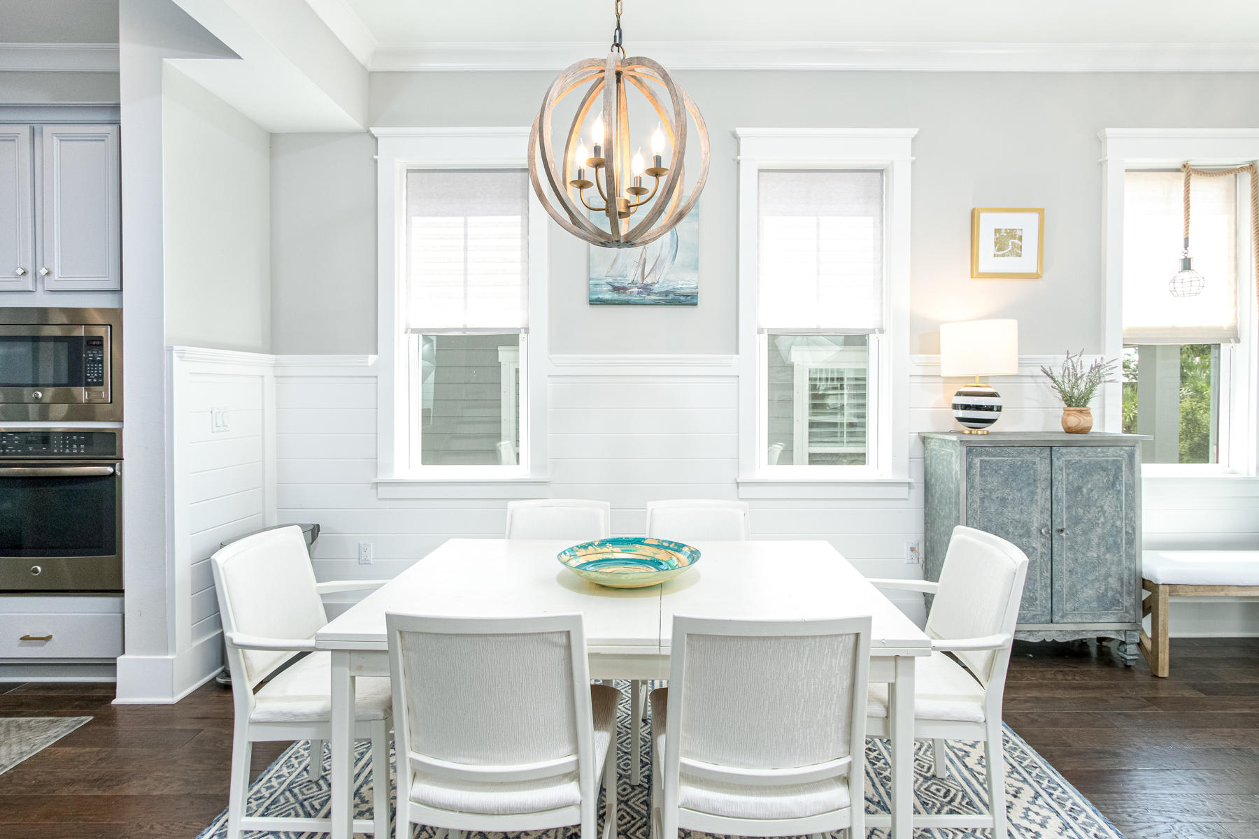 116 Gulfview Way Santa Rosa Beach, FL 32459 - Photo 11 of 57 a dining room with furniture a rug a potted plant and a window
