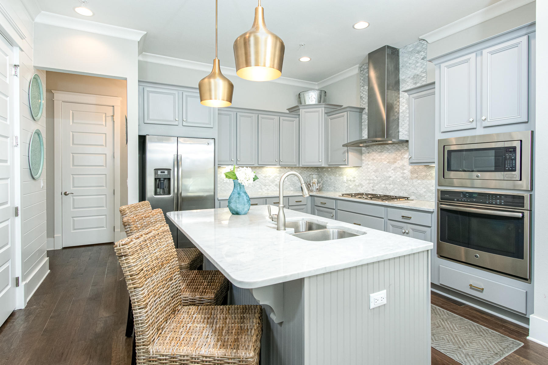 116 Gulfview Way Santa Rosa Beach, FL 32459 - Photo 3 of 57 a kitchen with a sink a stove and chairs