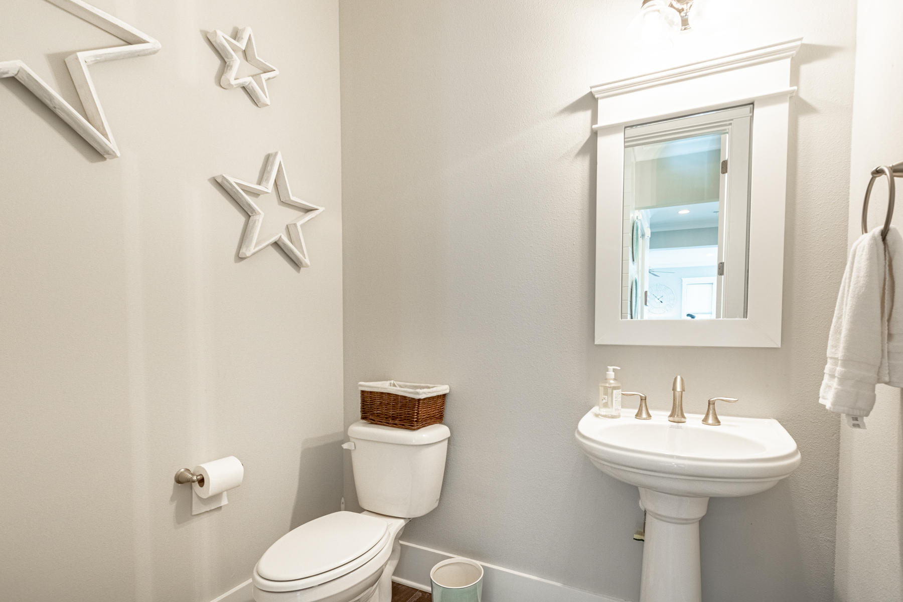 116 Gulfview Way Santa Rosa Beach, FL 32459 - Photo 25 of 57 a bathroom with a toilet sink and mirror