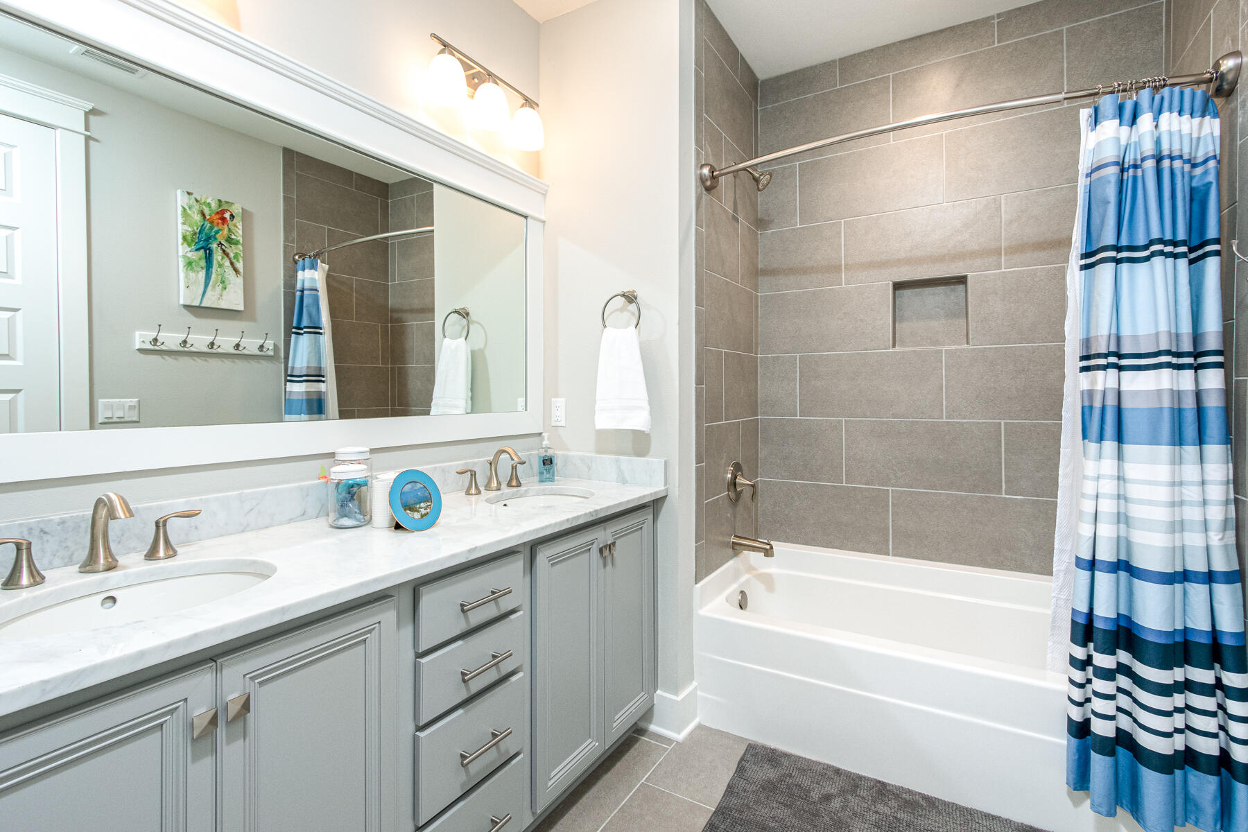 116 Gulfview Way Santa Rosa Beach, FL 32459 - Photo 29 of 57 a bathroom with a sink double vanity granite tub shower and a mirror