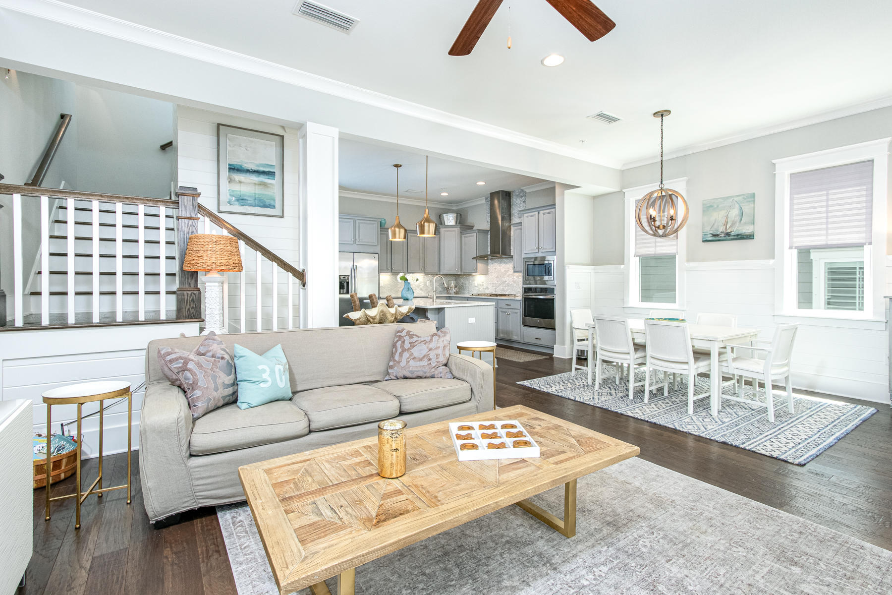 116 Gulfview Way Santa Rosa Beach, FL 32459 - Photo 9 of 57 a living room with furniture a dining table and a chandelier
