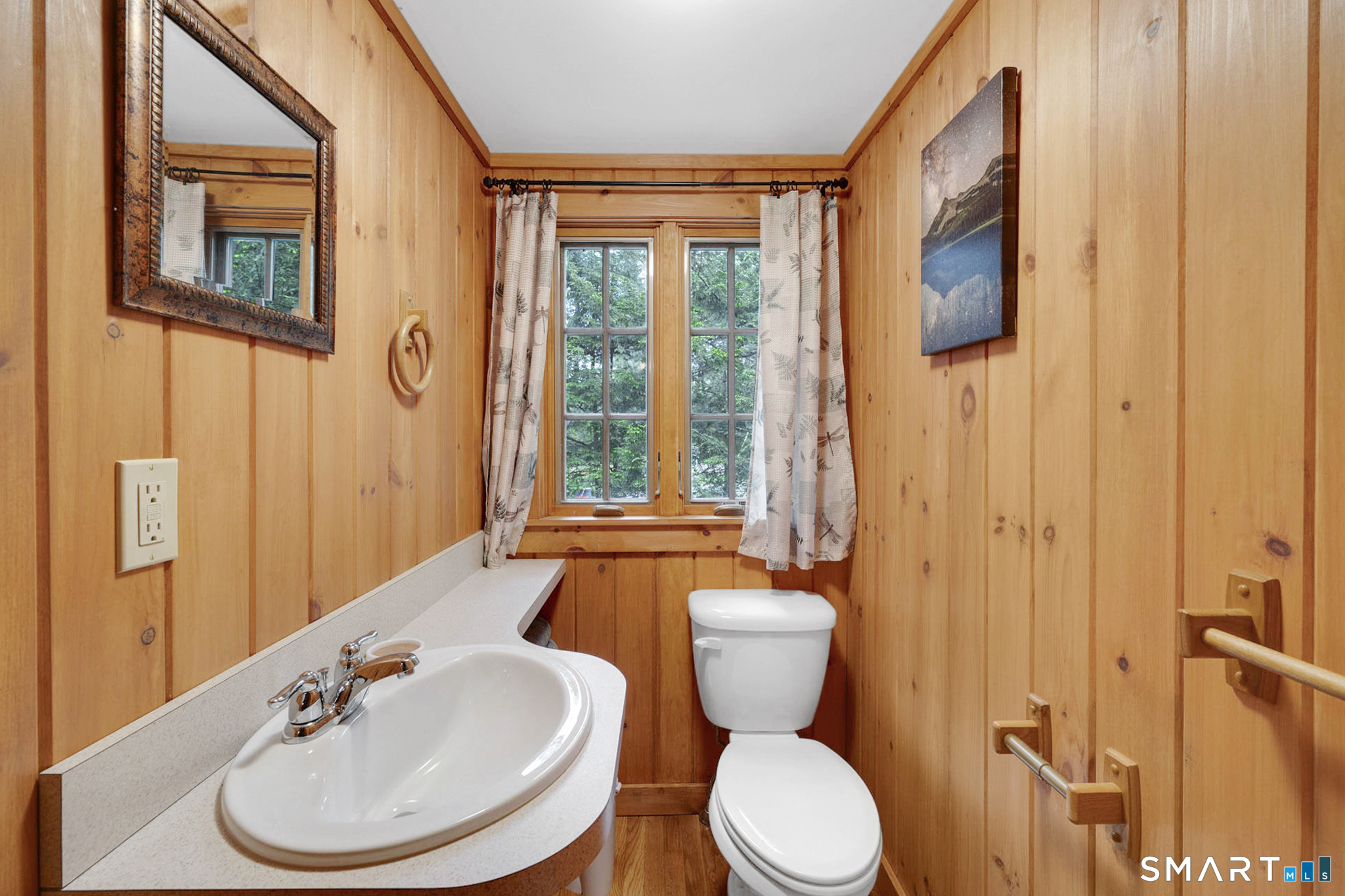 47 Pinehurst Road Hartland, CT 06091 - Photo 29 of 39 a bathroom with a toilet a sink and a mirror