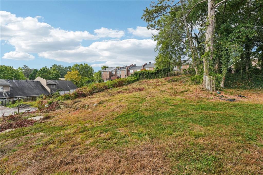 333 West Wieuca Road Northeast Atlanta, GA 30342 - Photo 7 of 8 a view of a yard with an outdoor space