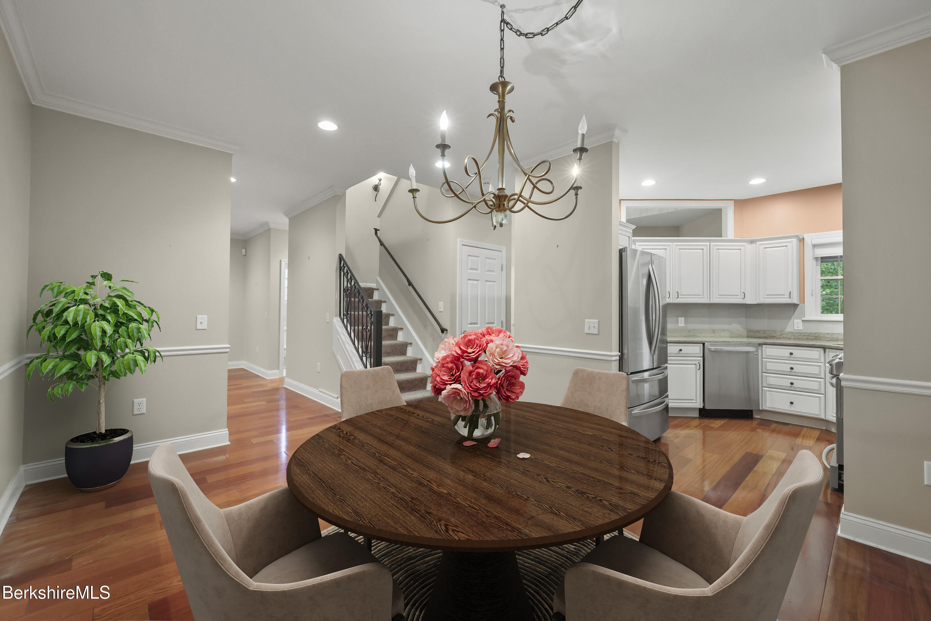 2 Amy Court, Unit 2 Pittsfield, MA 01201 - Photo 11 of 50 a dining room with furniture and wooden floor