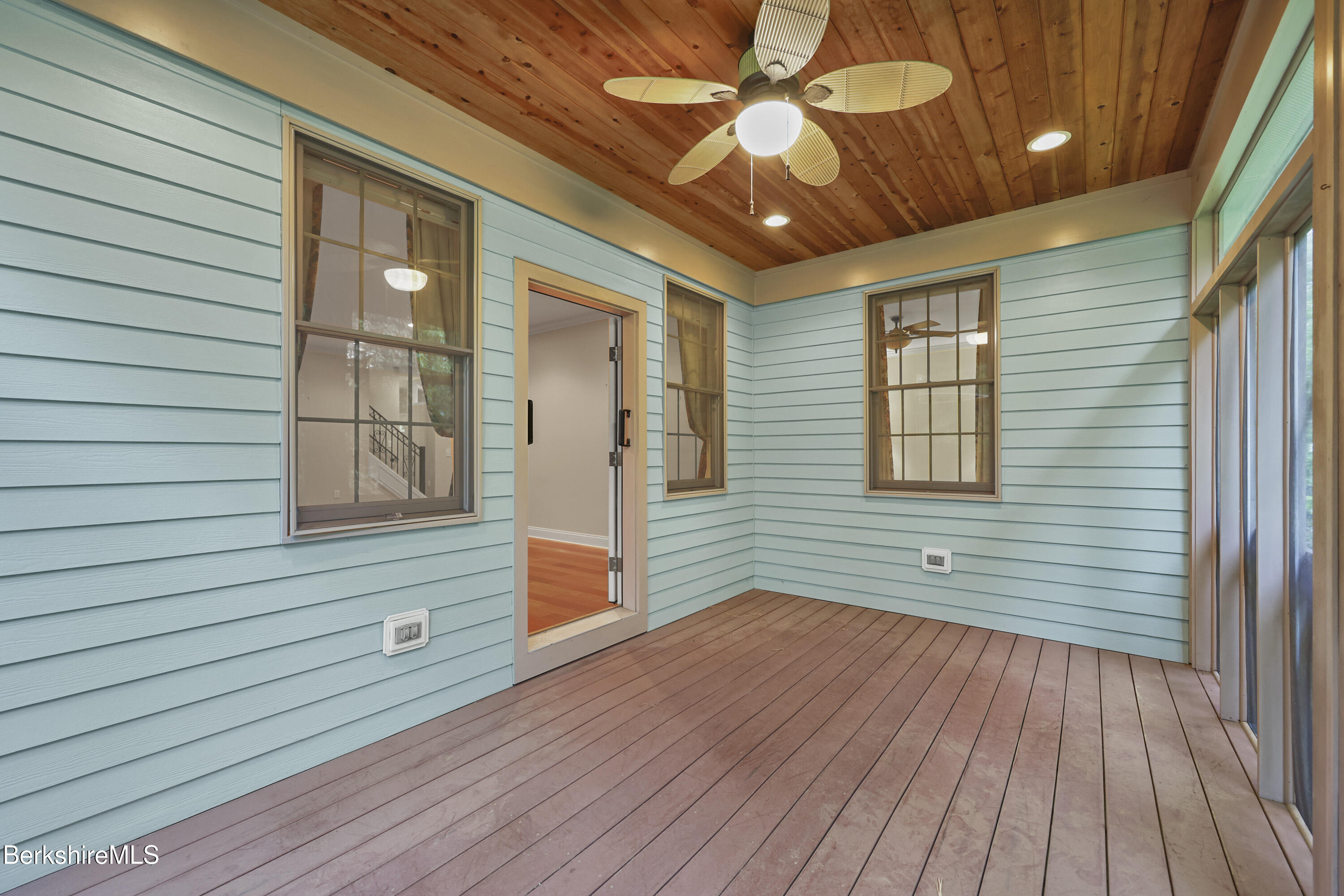 2 Amy Court, Unit 2 Pittsfield, MA 01201 - Photo 20 of 50 a view of a livingroom with wooden floor and a ceiling fan