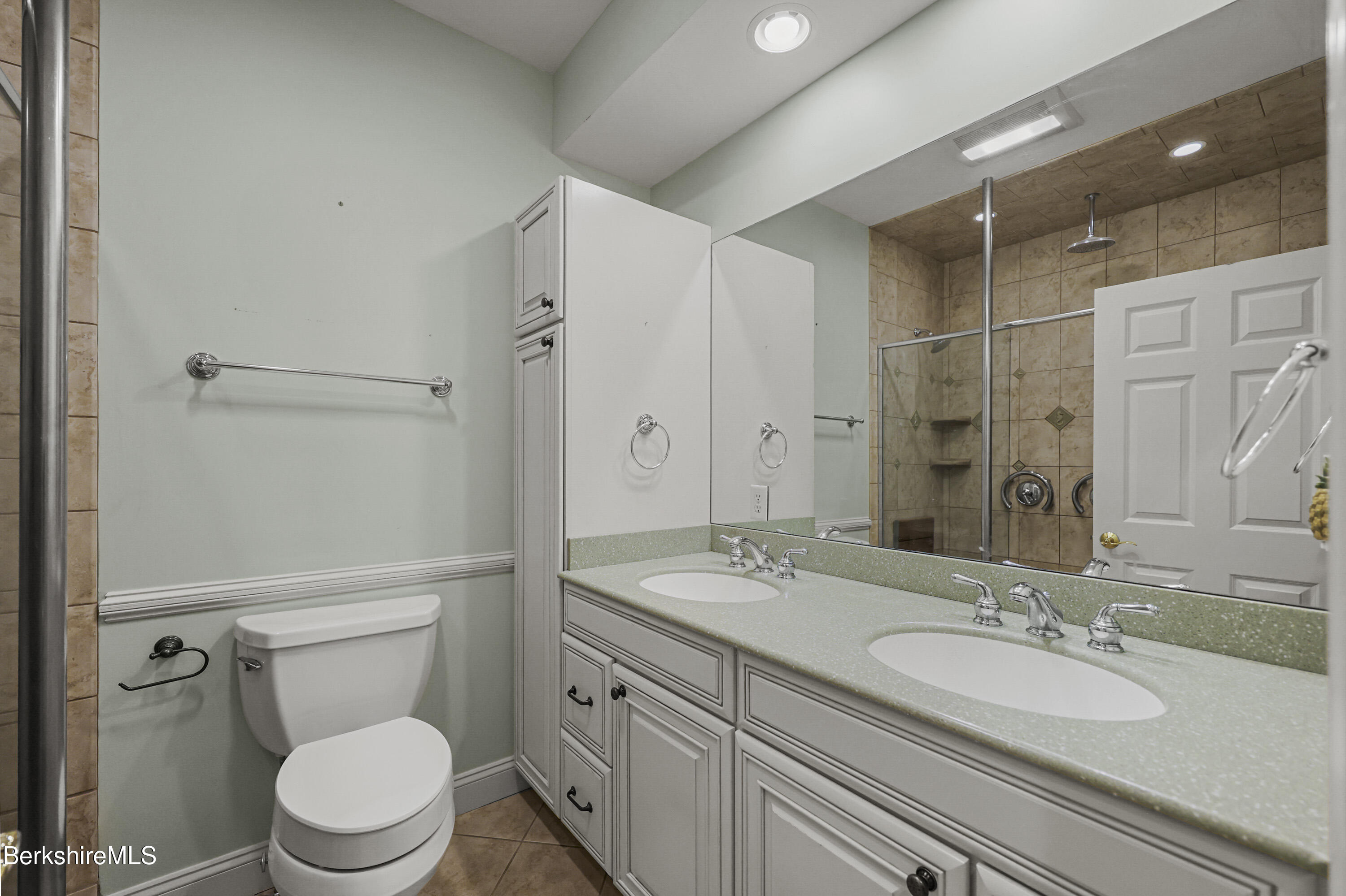 2 Amy Court, Unit 2 Pittsfield, MA 01201 - Photo 24 of 50 a bathroom with a granite countertop sink toilet a mirror and shower