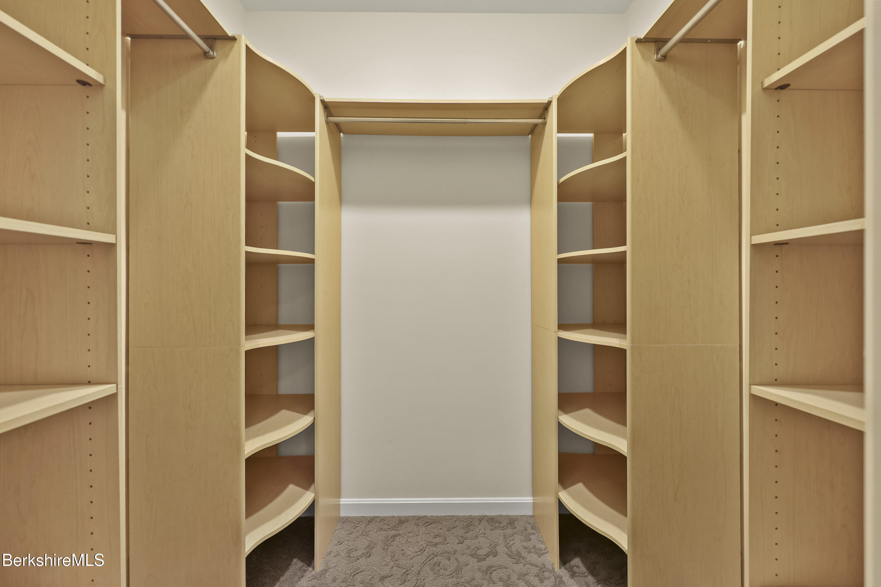 2 Amy Court, Unit 2 Pittsfield, MA 01201 - Photo 33 of 50 a view of walk in closet with empty racks