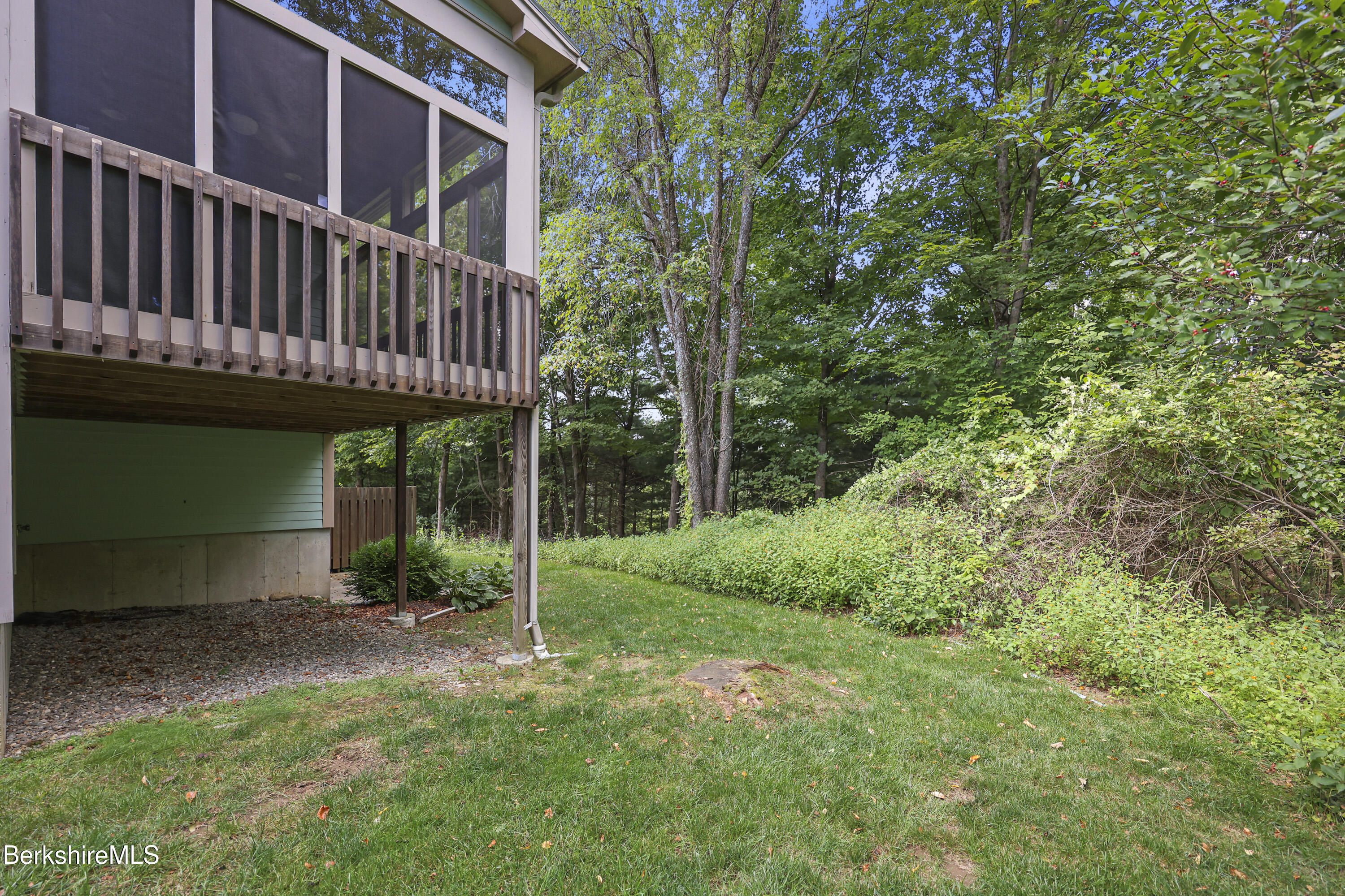 2 Amy Court, Unit 2 Pittsfield, MA 01201 - Photo 4 of 50 a view of a house with a yard and deck