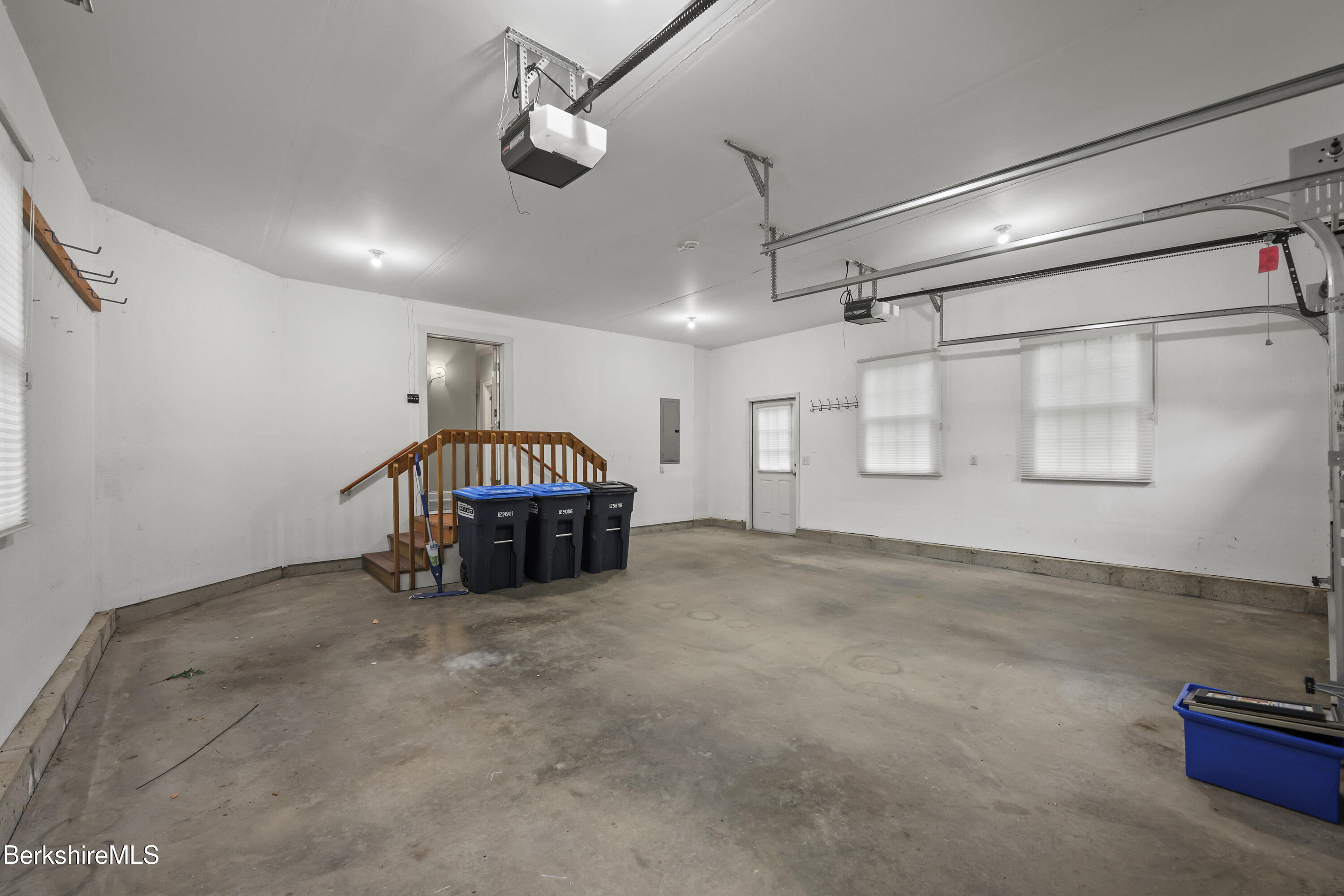 2 Amy Court, Unit 2 Pittsfield, MA 01201 - Photo 50 of 50 a spacious bedroom with a bed and a view of kitchen