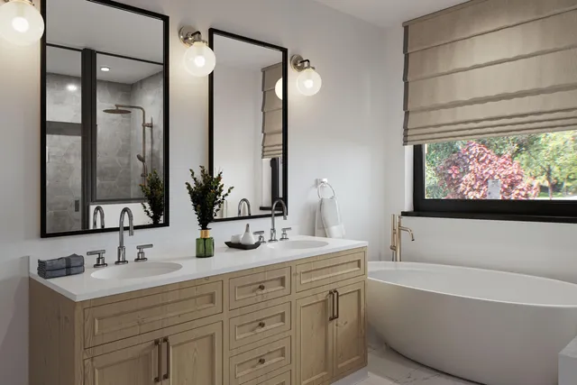 a bathroom with a tub a sink and mirror