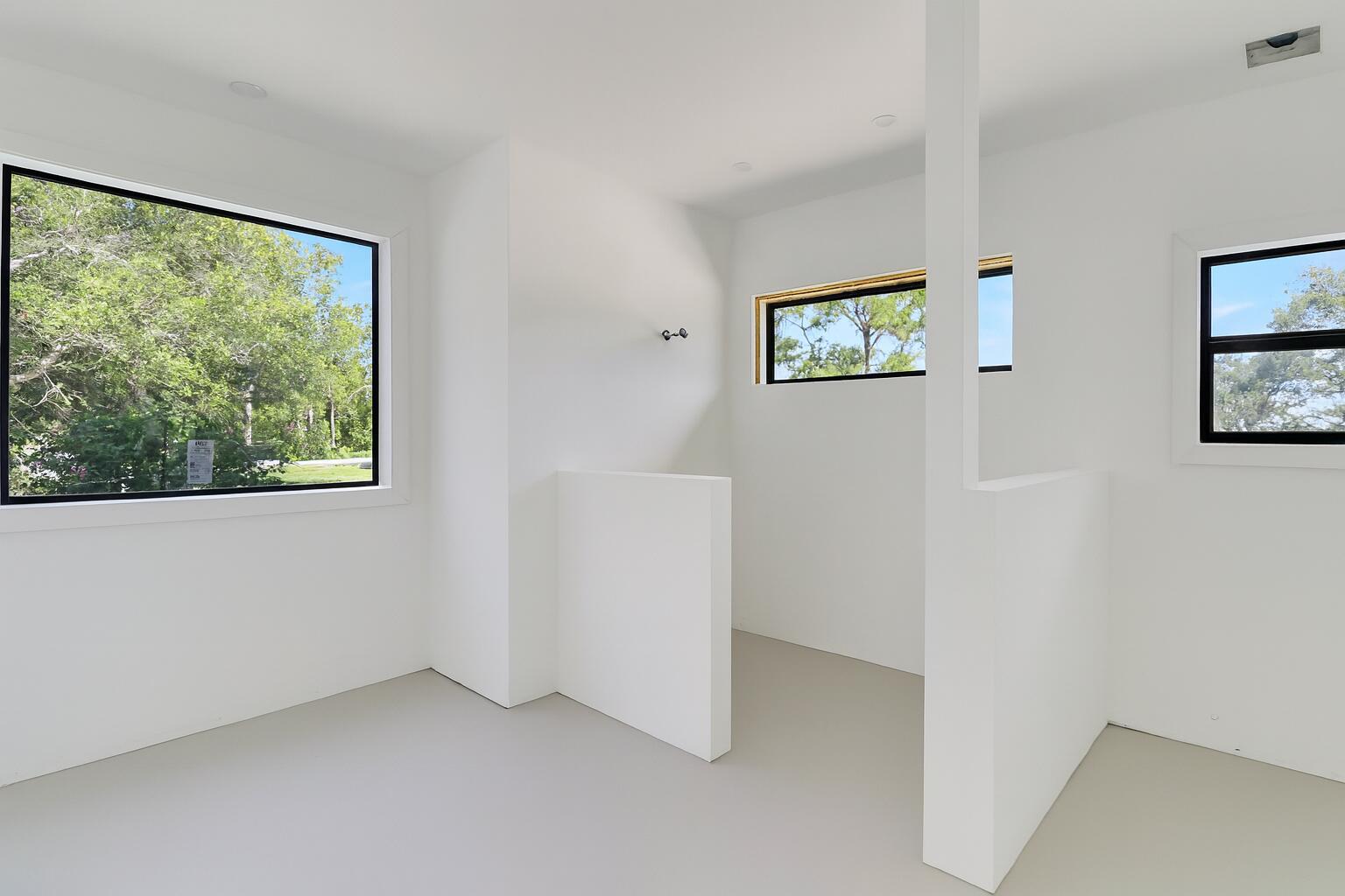 18851 Mack Dairy Road Jupiter, FL 33478 - Photo 21 of 47 a view of an empty room with a window