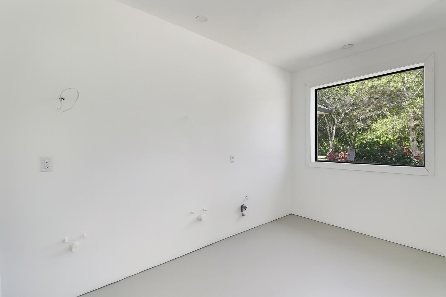 18851 Mack Dairy Road Jupiter, FL 33478 - Photo 22 of 47 a view of a room that has a window