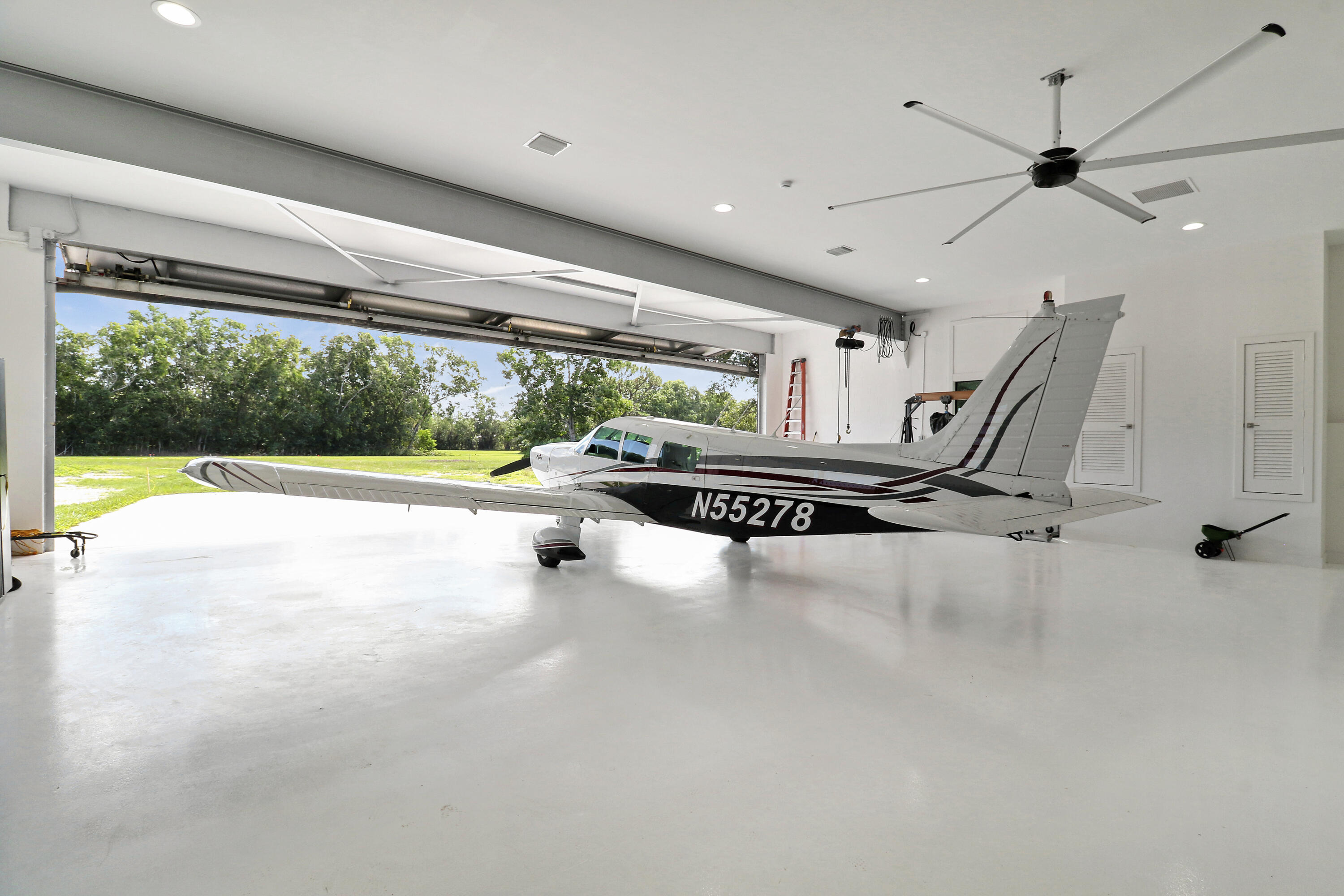 18851 Mack Dairy Road Jupiter, FL 33478 - Photo 28 of 47 a view of an empty room with a window