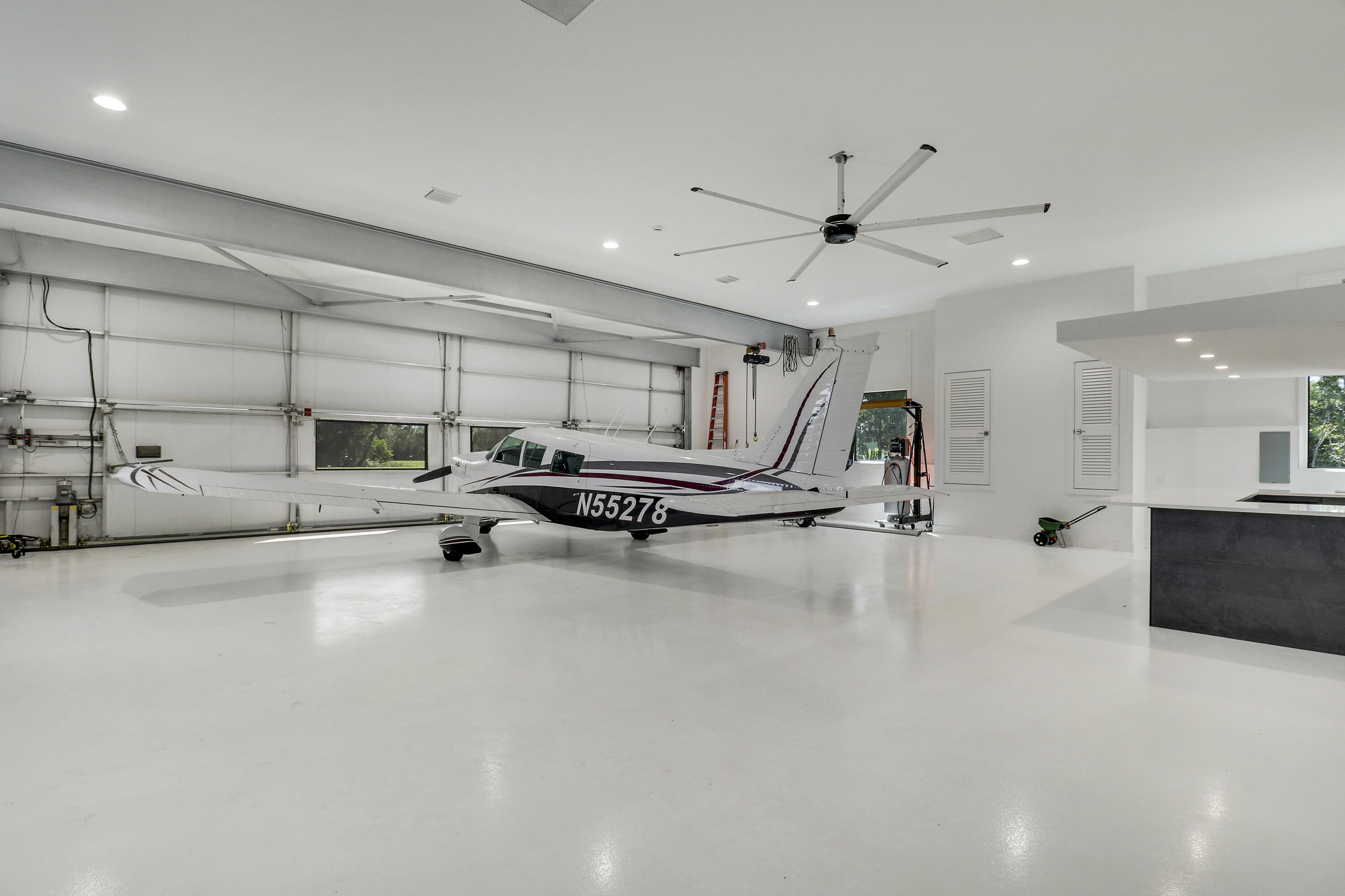 18851 Mack Dairy Road Jupiter, FL 33478 - Photo 29 of 47 a view of a room with gym equipment