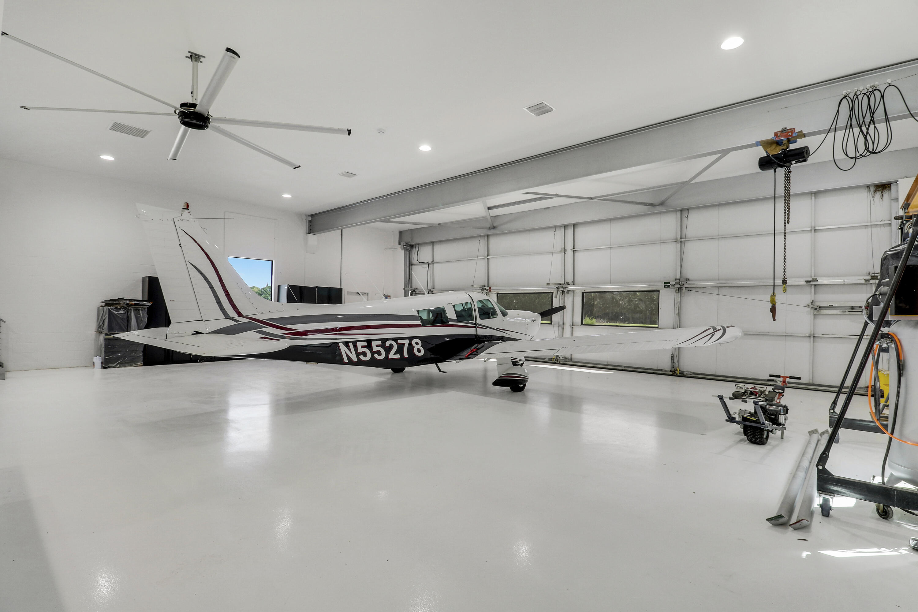 18851 Mack Dairy Road Jupiter, FL 33478 - Photo 30 of 47 a view of a room with gym equipment