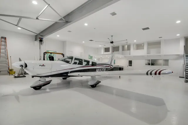 a large room with gym equipment