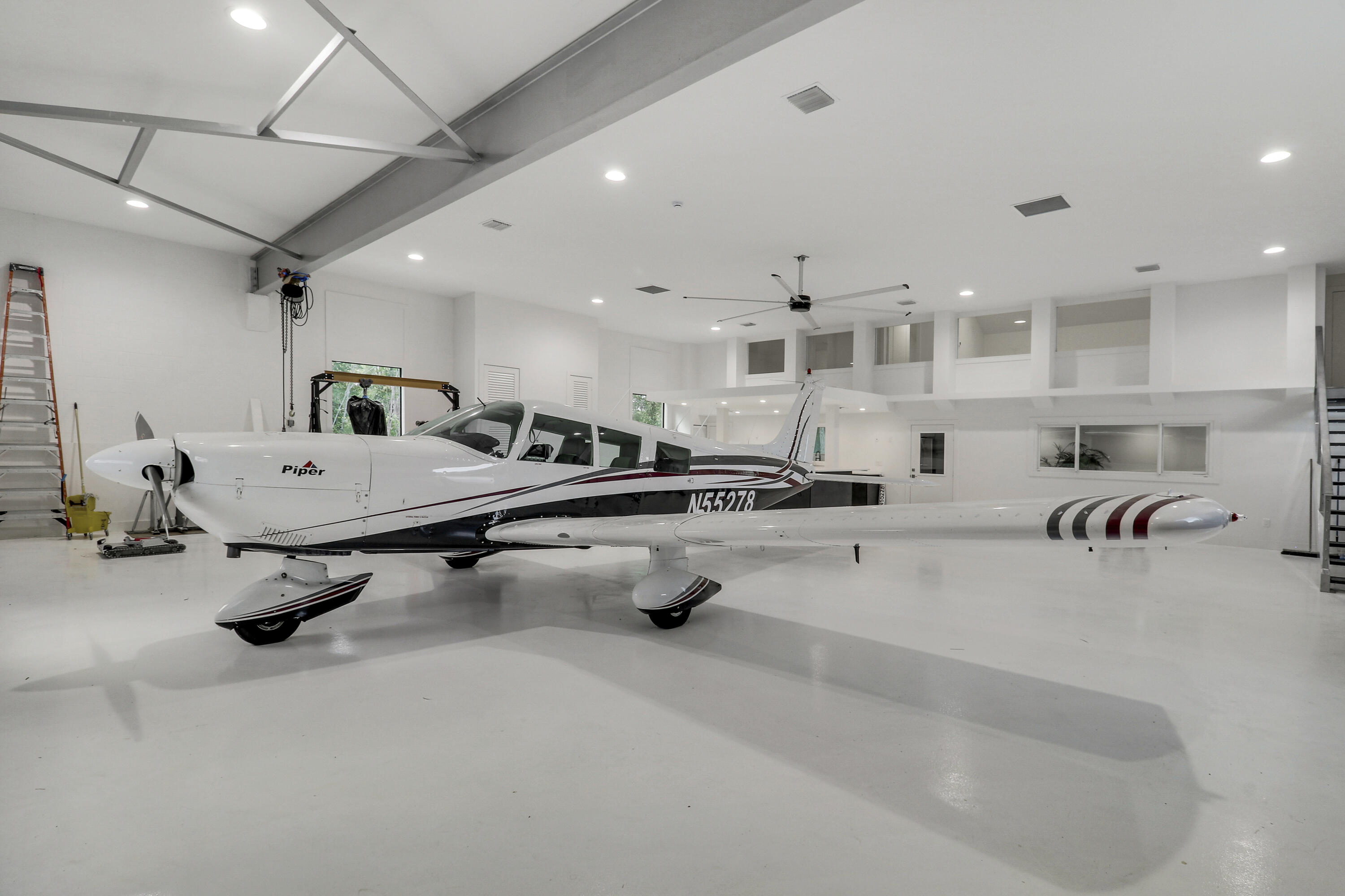 18851 Mack Dairy Road Jupiter, FL 33478 - Photo 32 of 47 a large room with gym equipment