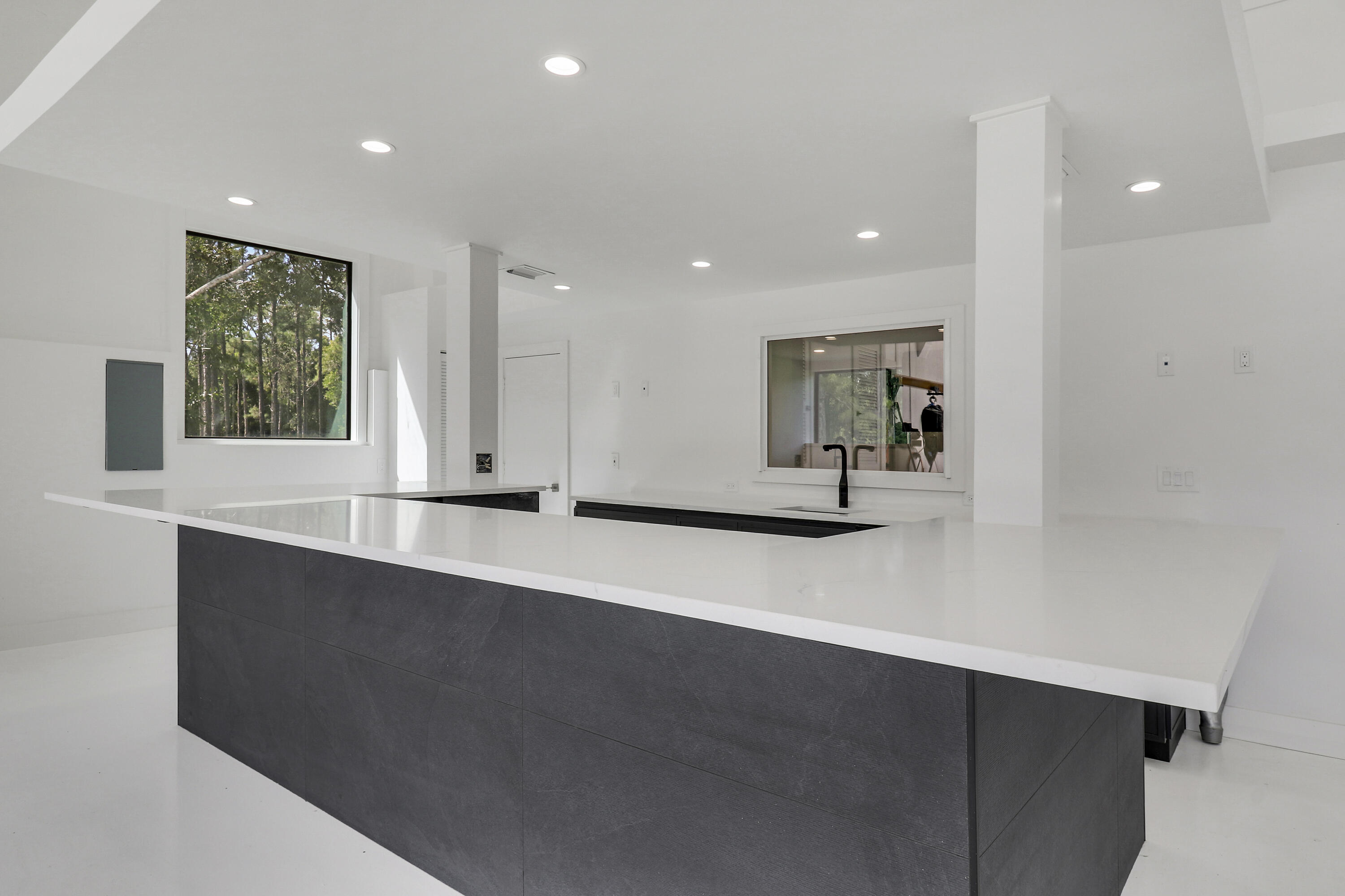 18851 Mack Dairy Road Jupiter, FL 33478 - Photo 33 of 47 a view of kitchen with stainless steel appliances granite countertop a sink a stove and a window