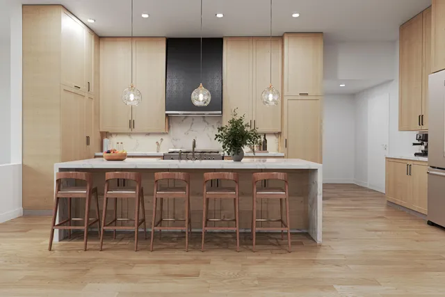 a kitchen with granite countertop a sink and cabinets