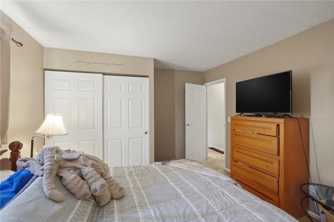 4780 Old Salem Road Englewood, OH 45322 - Photo 13 of 30 This cozy bedroom provides a comfortable retreat with ample storage and natural light.