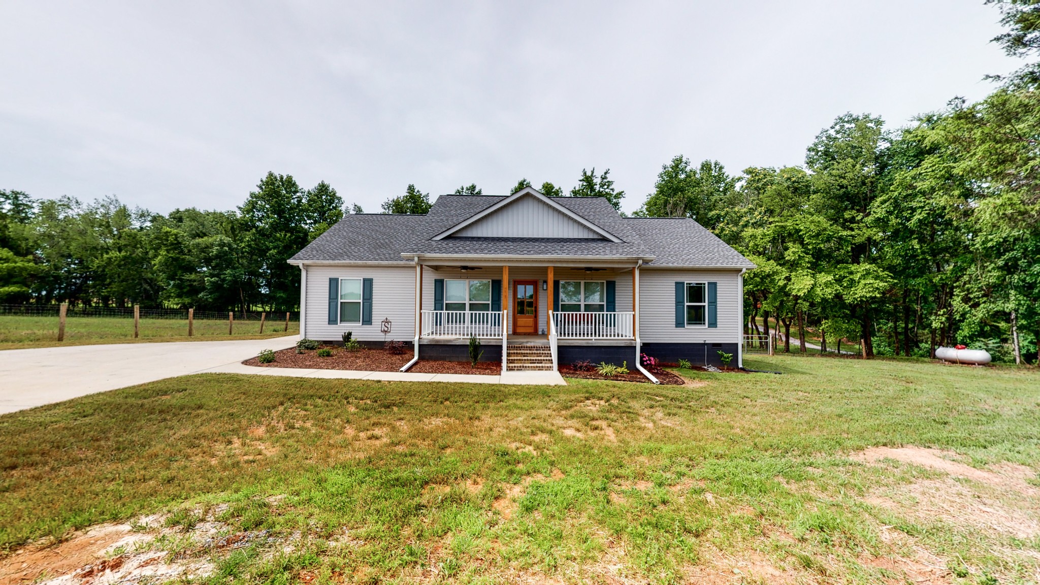 142 Philpot Road Ardmore, TN 38449 - Photo 1 of 51 a view of a house with swimming pool and yard