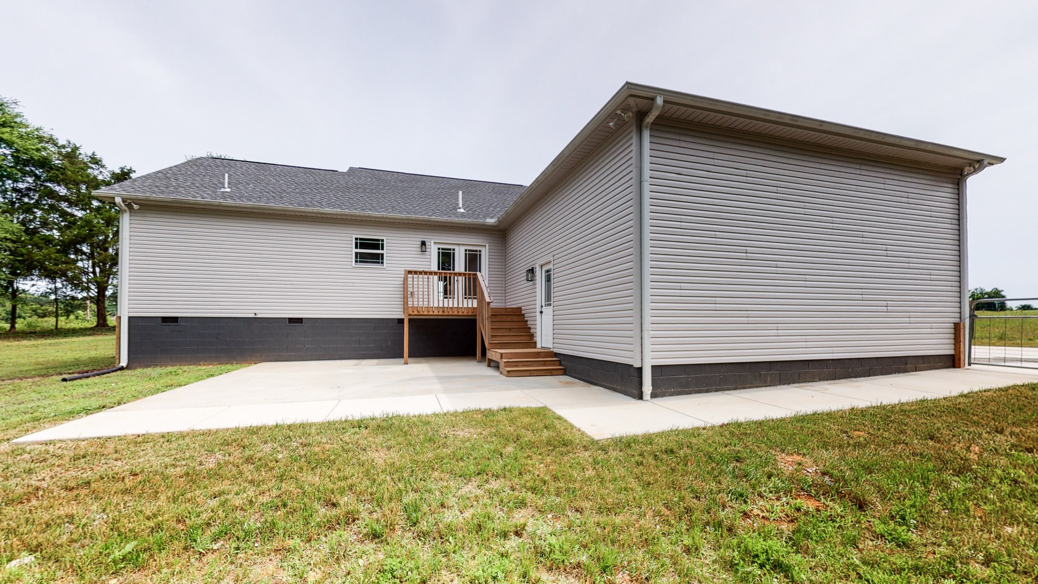 142 Philpot Road Ardmore, TN 38449 - Photo 11 of 51 a view of a house with a yard and garage