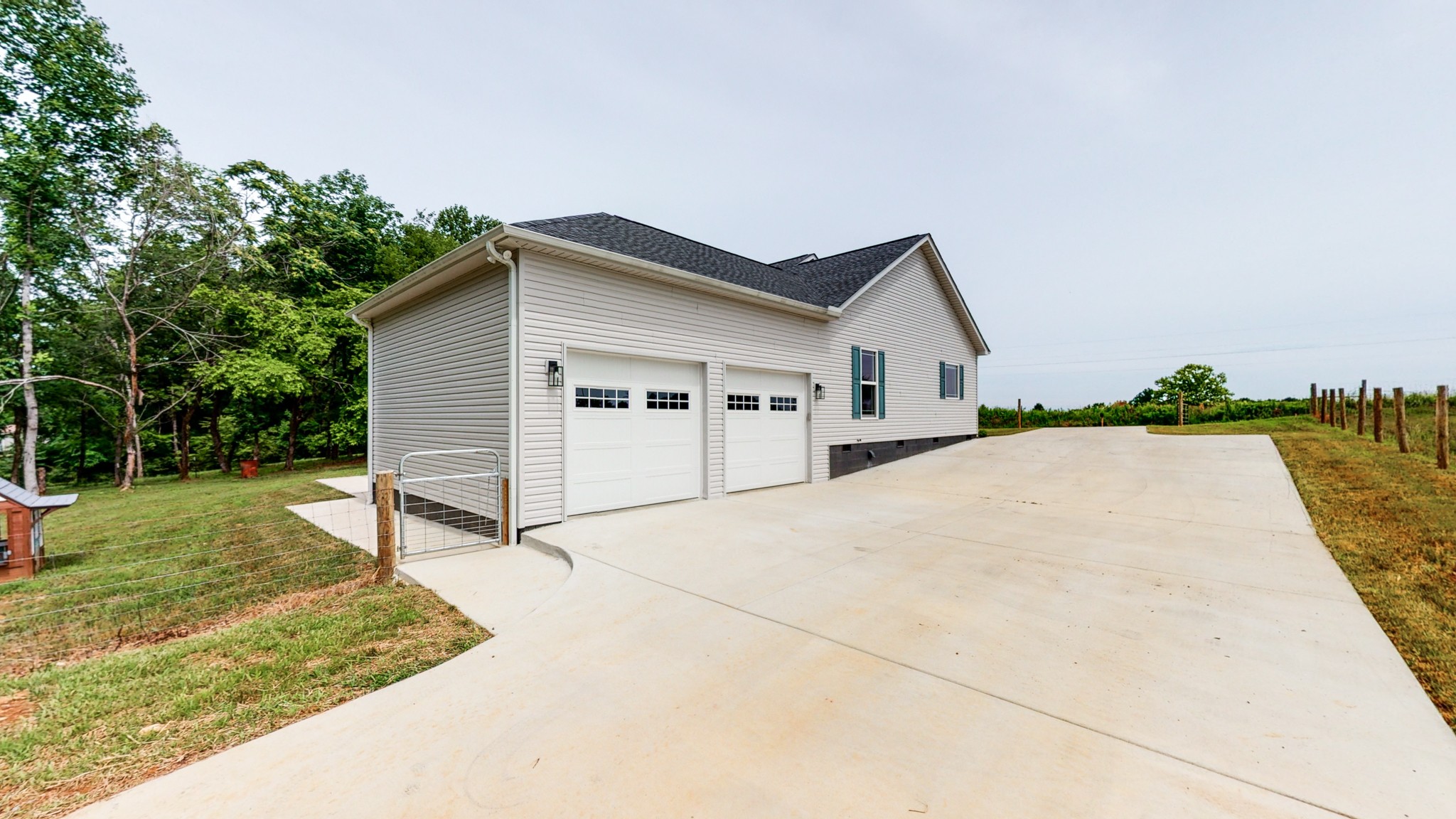 142 Philpot Road Ardmore, TN 38449 - Photo 16 of 51 a view of a house with backyard and trees