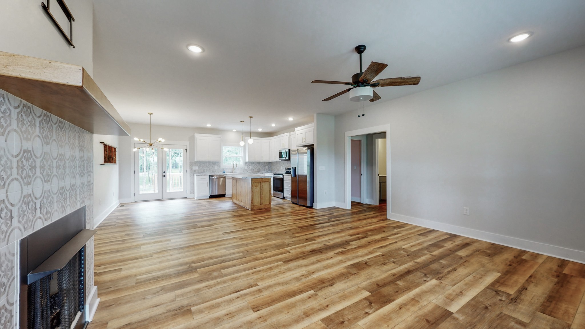 142 Philpot Road Ardmore, TN 38449 - Photo 19 of 51 a view of an empty room with wooden floor