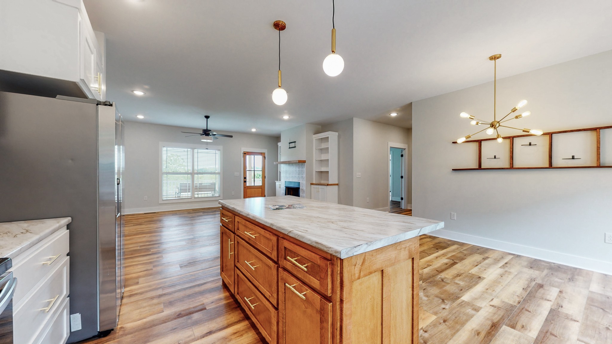 142 Philpot Road Ardmore, TN 38449 - Photo 27 of 51 a view of kitchen and hall with wooden floor
