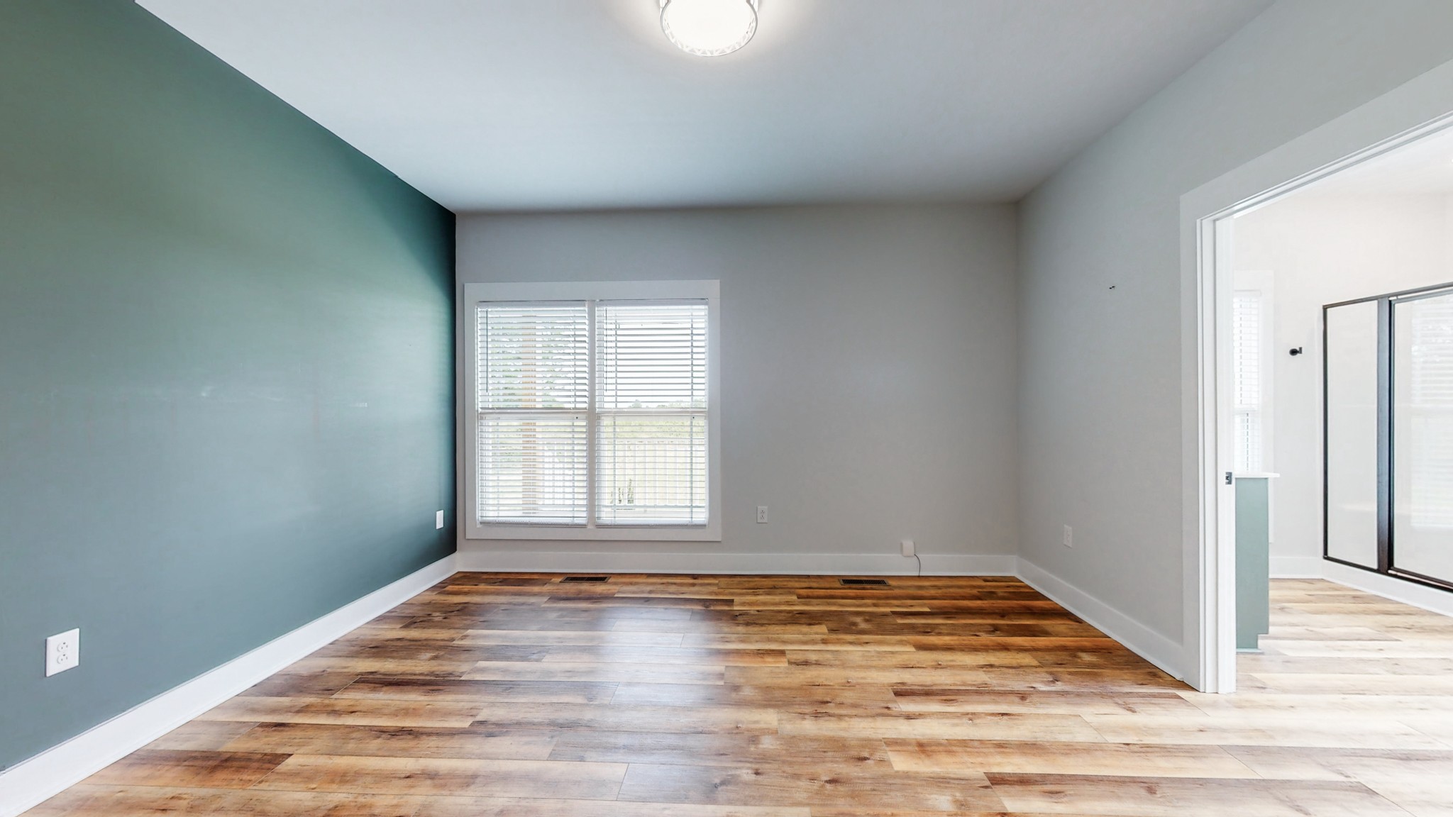 142 Philpot Road Ardmore, TN 38449 - Photo 32 of 51 a view of empty room with wooden floor and fan