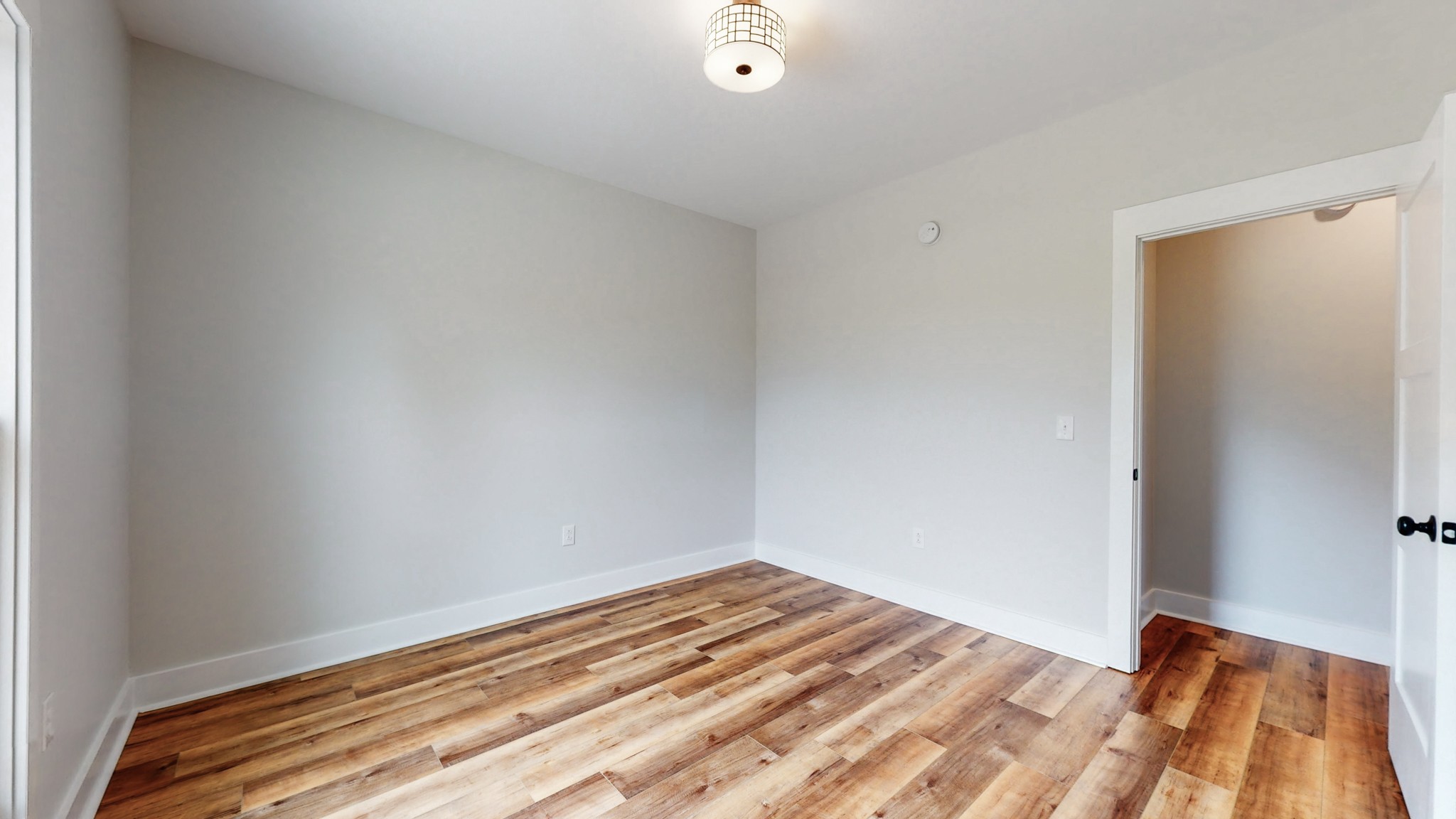 142 Philpot Road Ardmore, TN 38449 - Photo 41 of 51 a view of a room with wooden floor and white walls