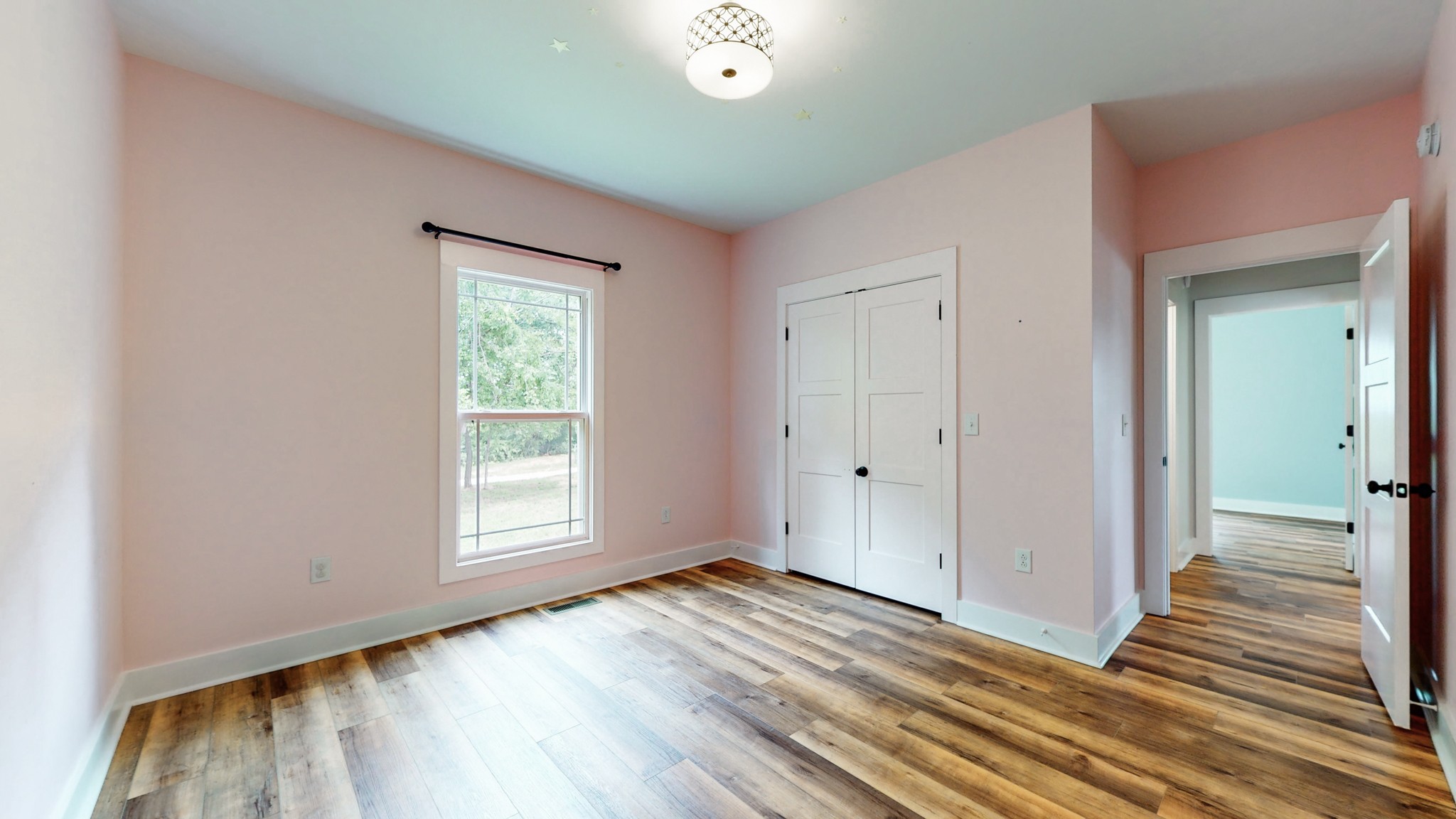 142 Philpot Road Ardmore, TN 38449 - Photo 43 of 51 a view of a livingroom with wooden floor and window