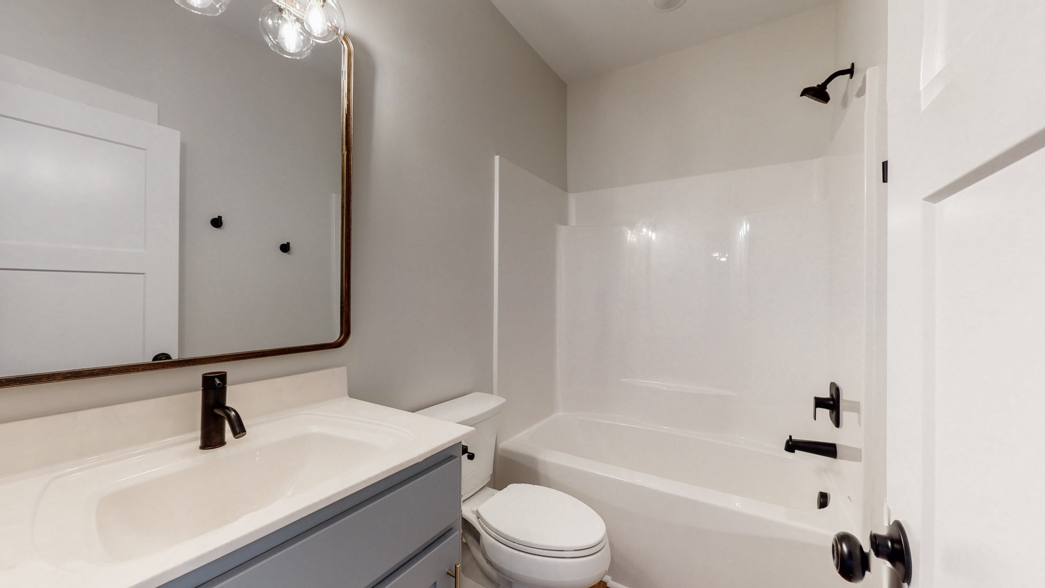 142 Philpot Road Ardmore, TN 38449 - Photo 44 of 51 a bathroom with a sink a toilet and a tub