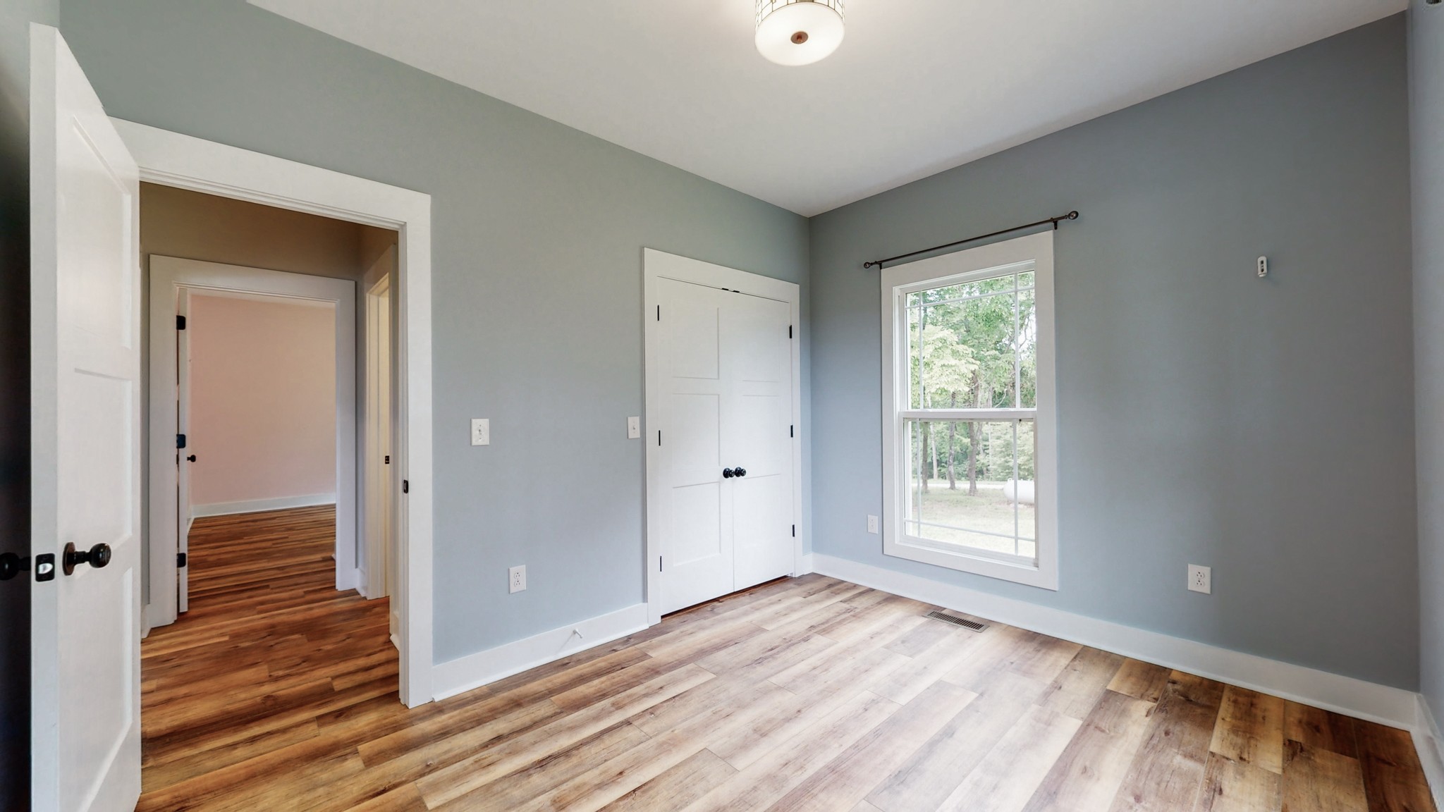 142 Philpot Road Ardmore, TN 38449 - Photo 47 of 51 a view of a room with wooden floor and window