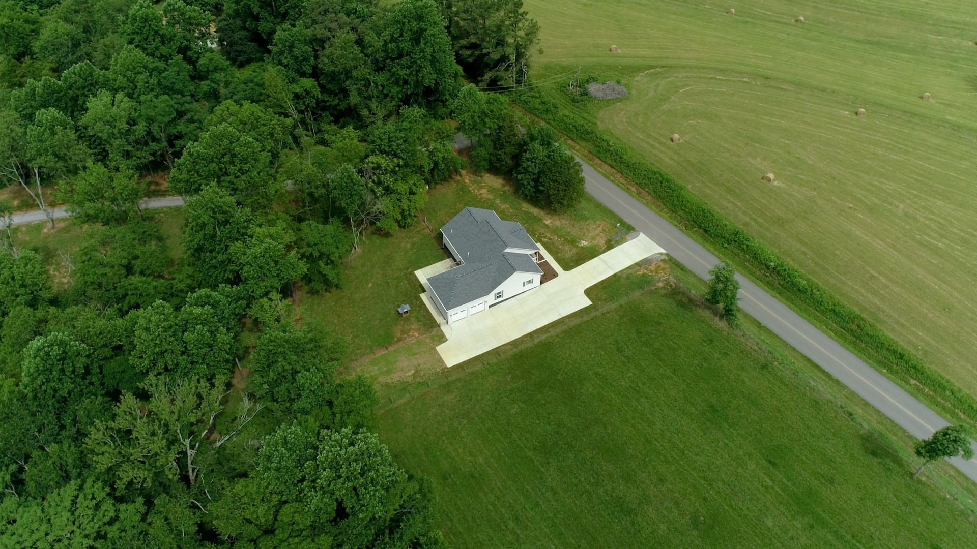 142 Philpot Road Ardmore, TN 38449 - Photo 50 of 51 a view of a house with a yard