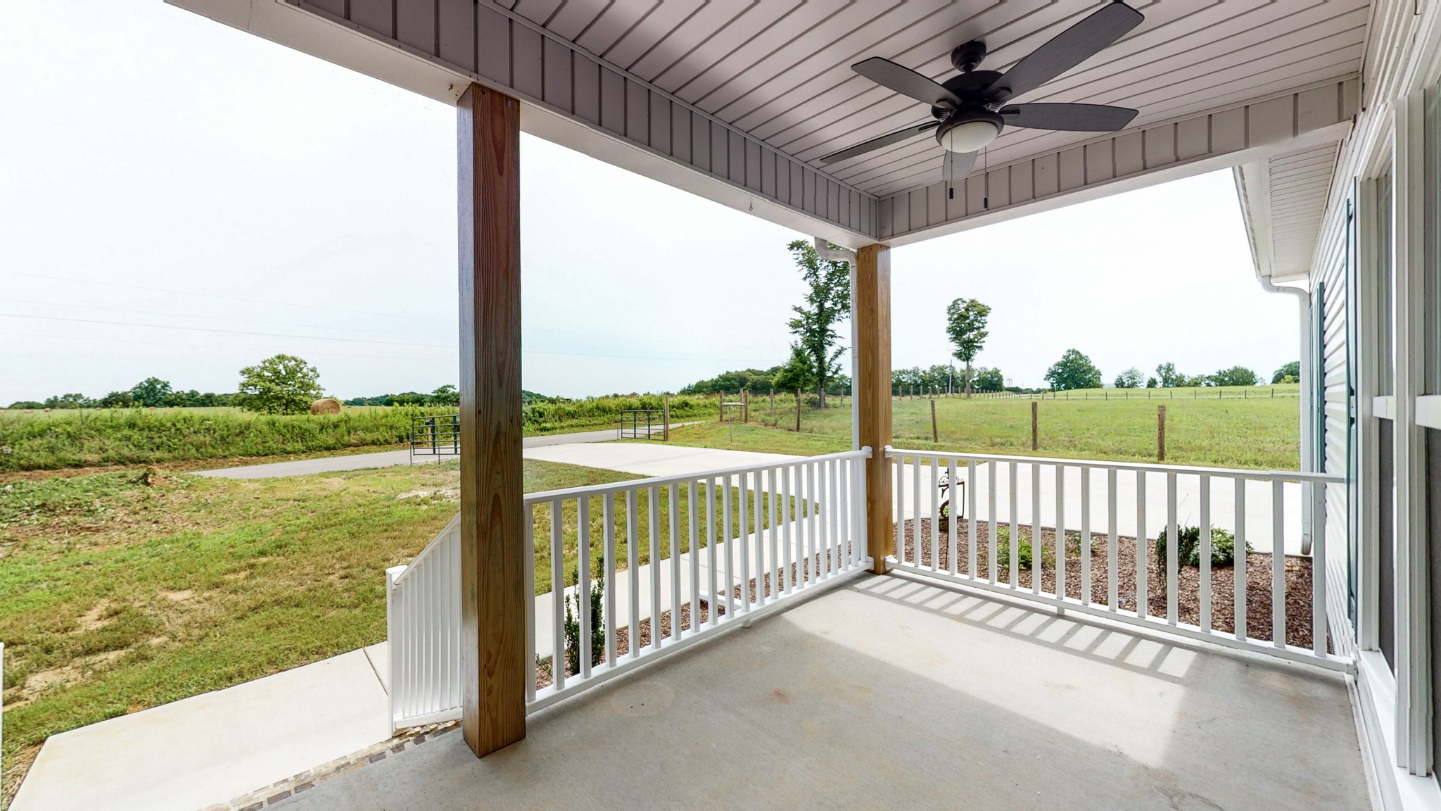 142 Philpot Road Ardmore, TN 38449 - Photo 9 of 51 a view of a porch with wooden floor
