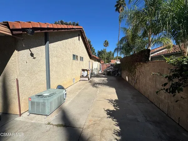 a view of a back yard of the house